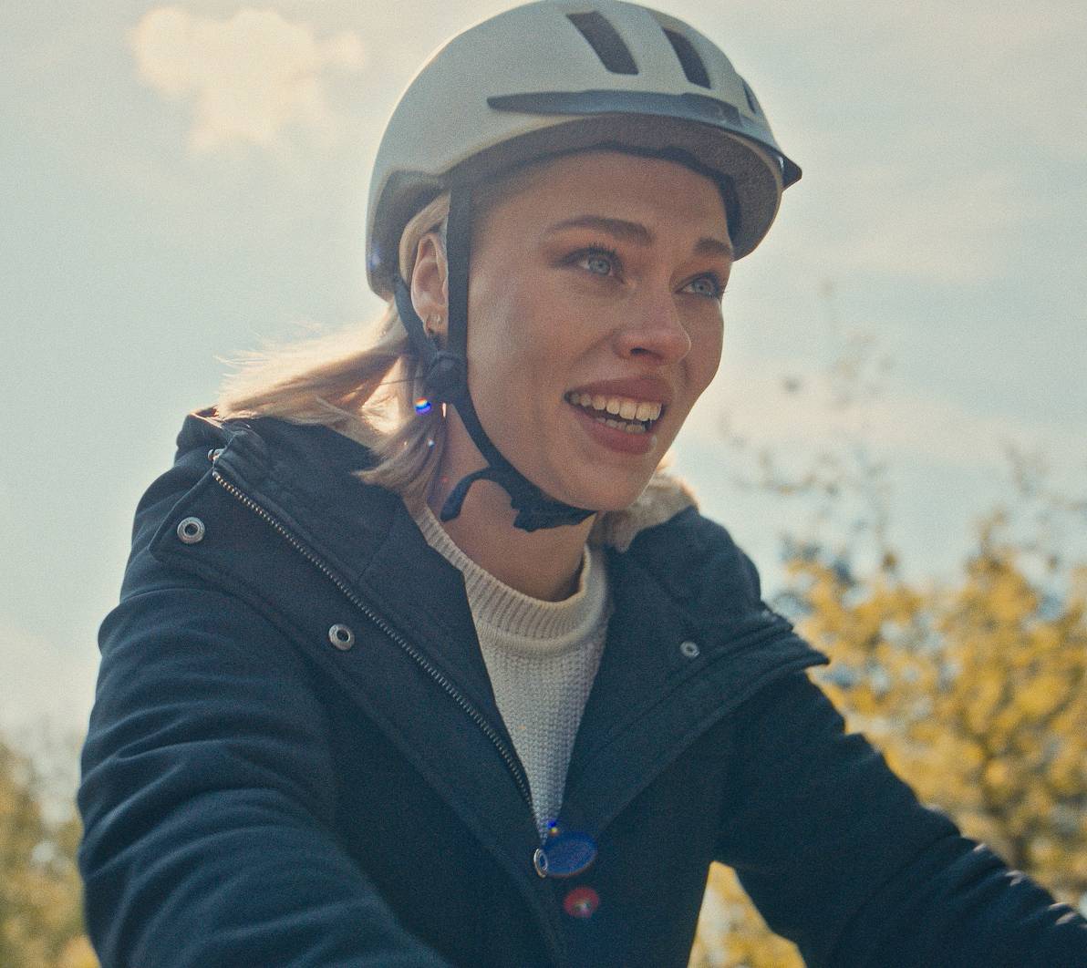 Woman with helmet laughing