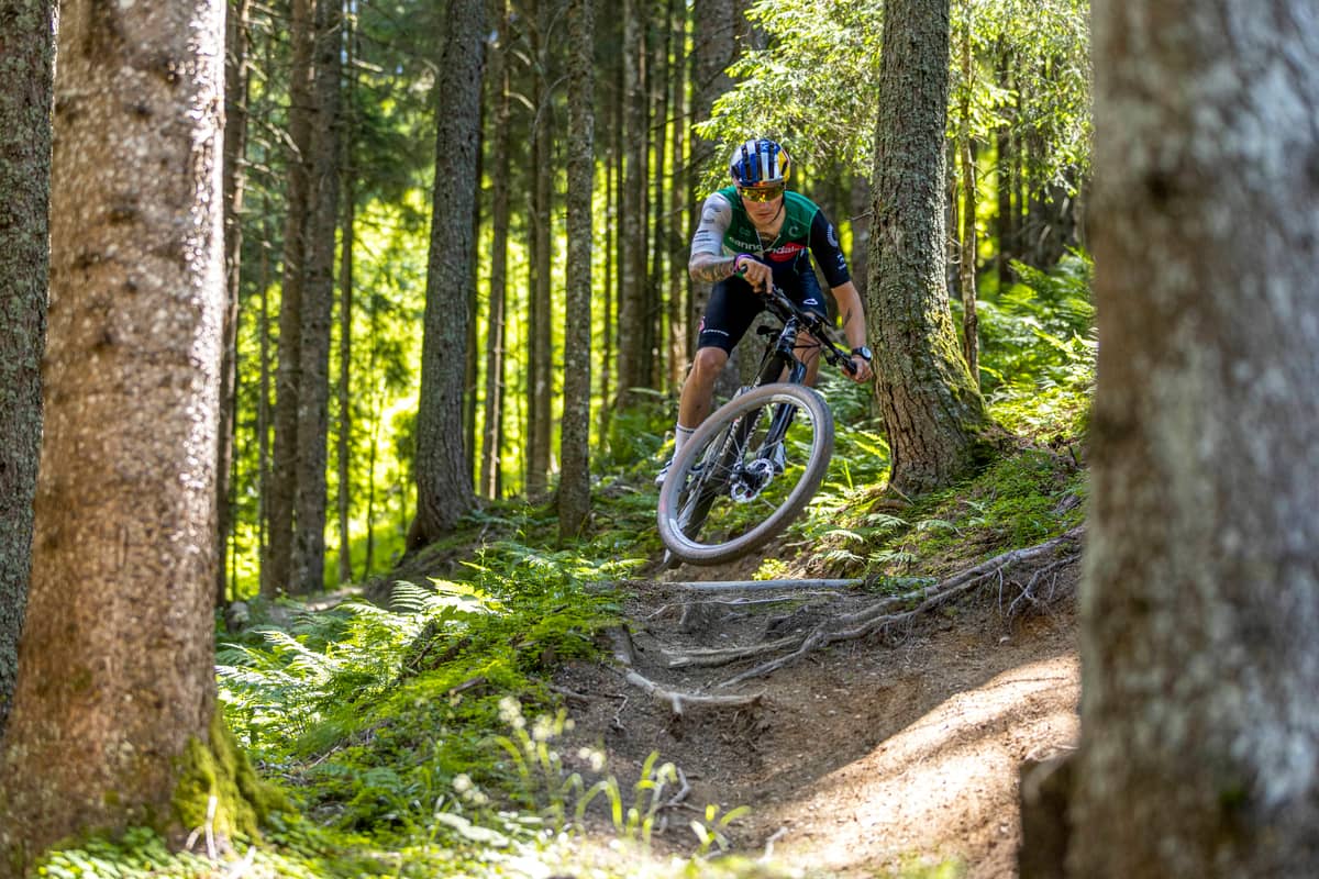 man with cannondale bike in forest