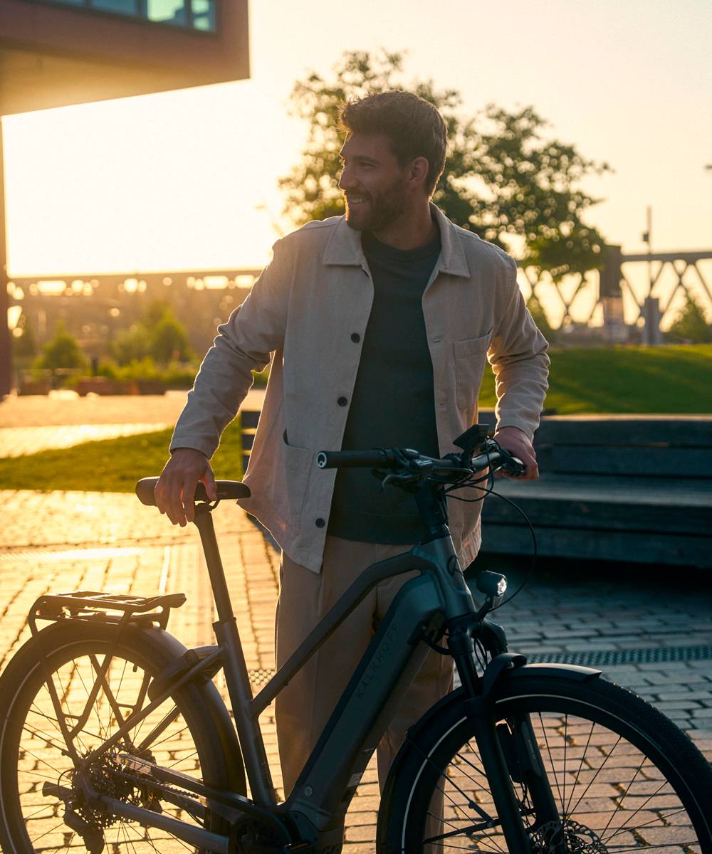 Man pushes e-bike